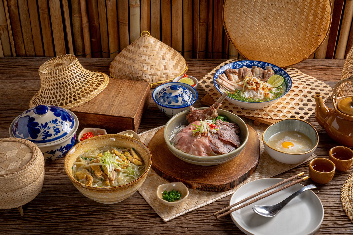 A spread of NGON's phở and rice noodle bowls